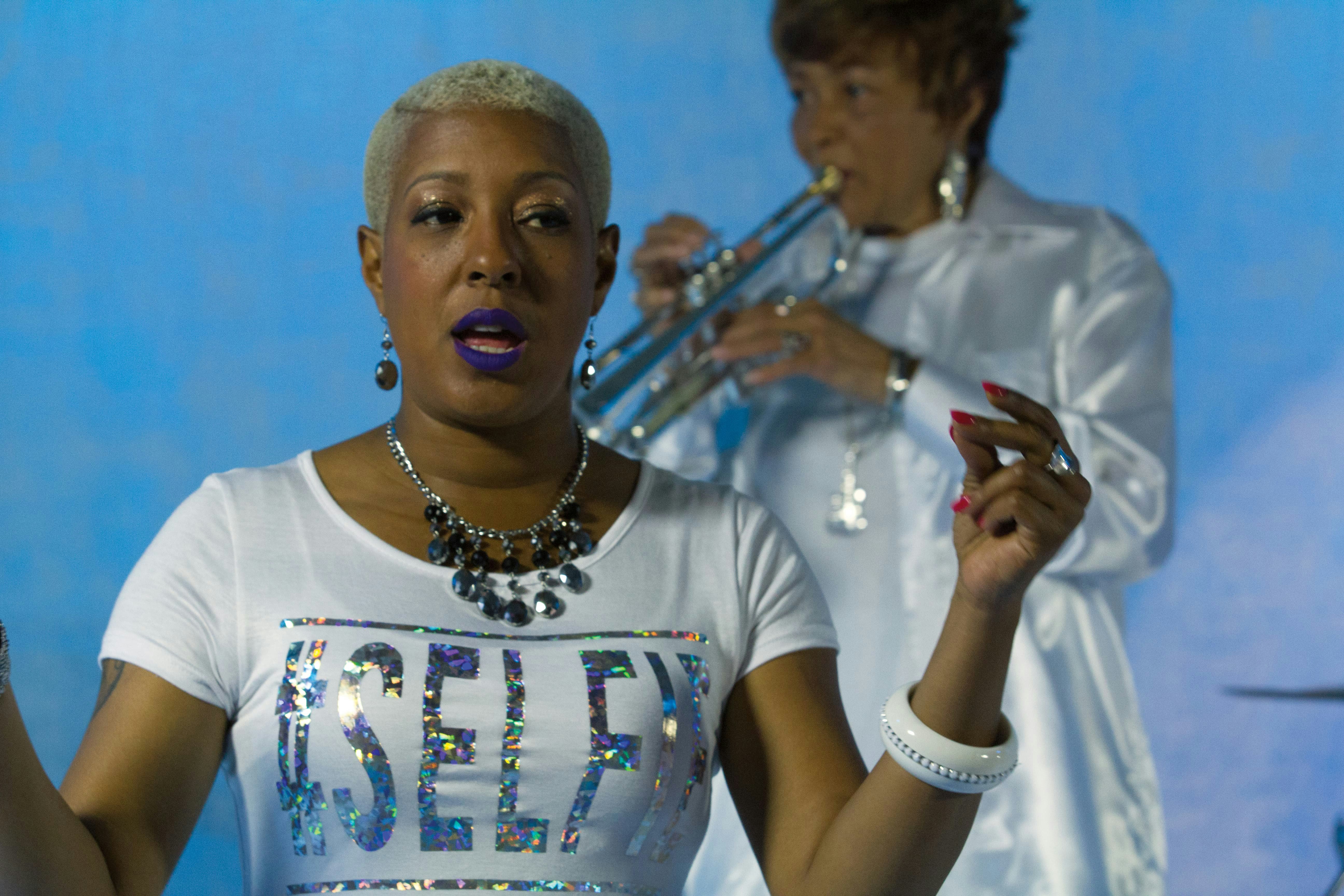 Phunne Stone and her mother Cynthia Robinson performing with the Family Stone for a video shoot in the summer of 2015. Photo by Ashina Hamilton.
